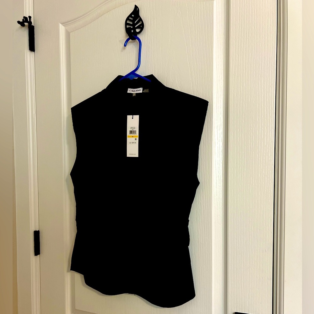New Calvin Klein Blouse collared, button up the front, soft gather on sides.
